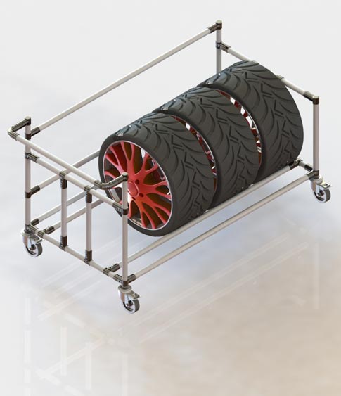 Nell'immagine: Carrello per trasporto pneumatici in officina. Pianale removibile opzionale per lo stoccaggio del set di gomme.